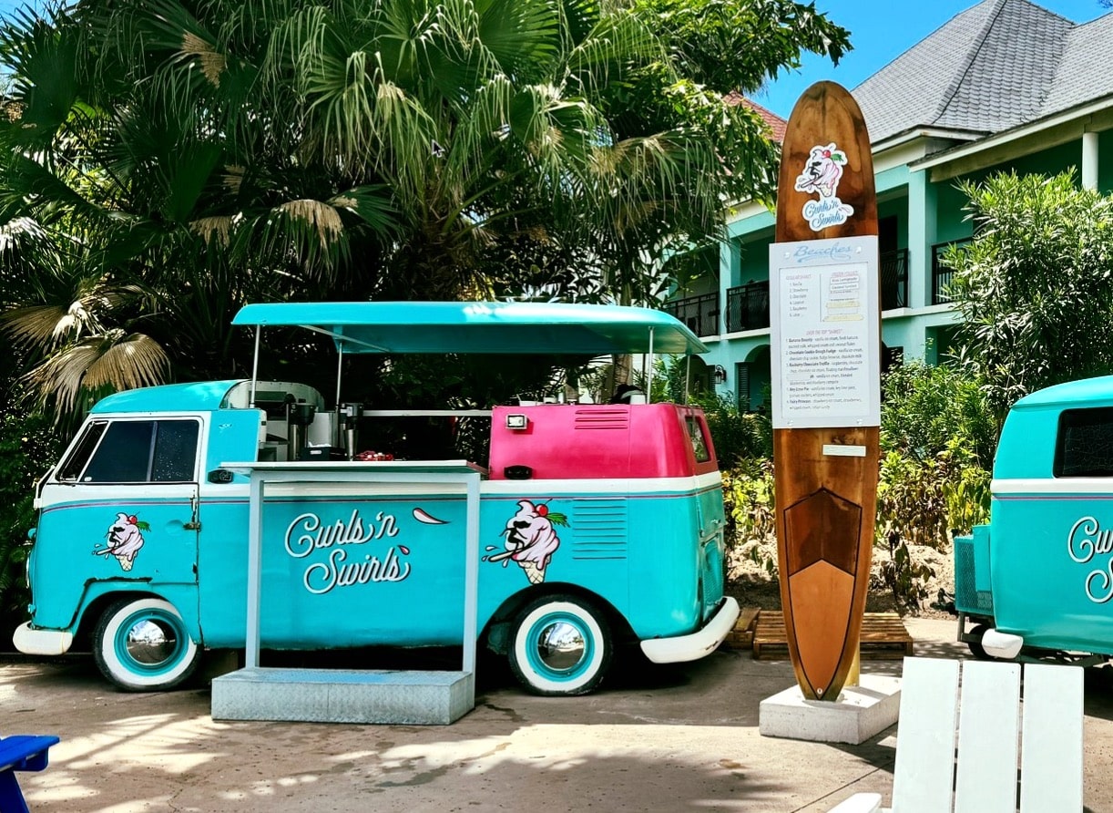 view of the Curls & Swirls ice cream truck at the french village water park