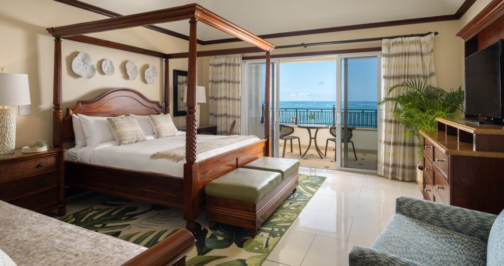 ocean view of grace bay looking out from inside the Italian Beachfront Penthouse Two Bedroom Imperial Butler Family Suite