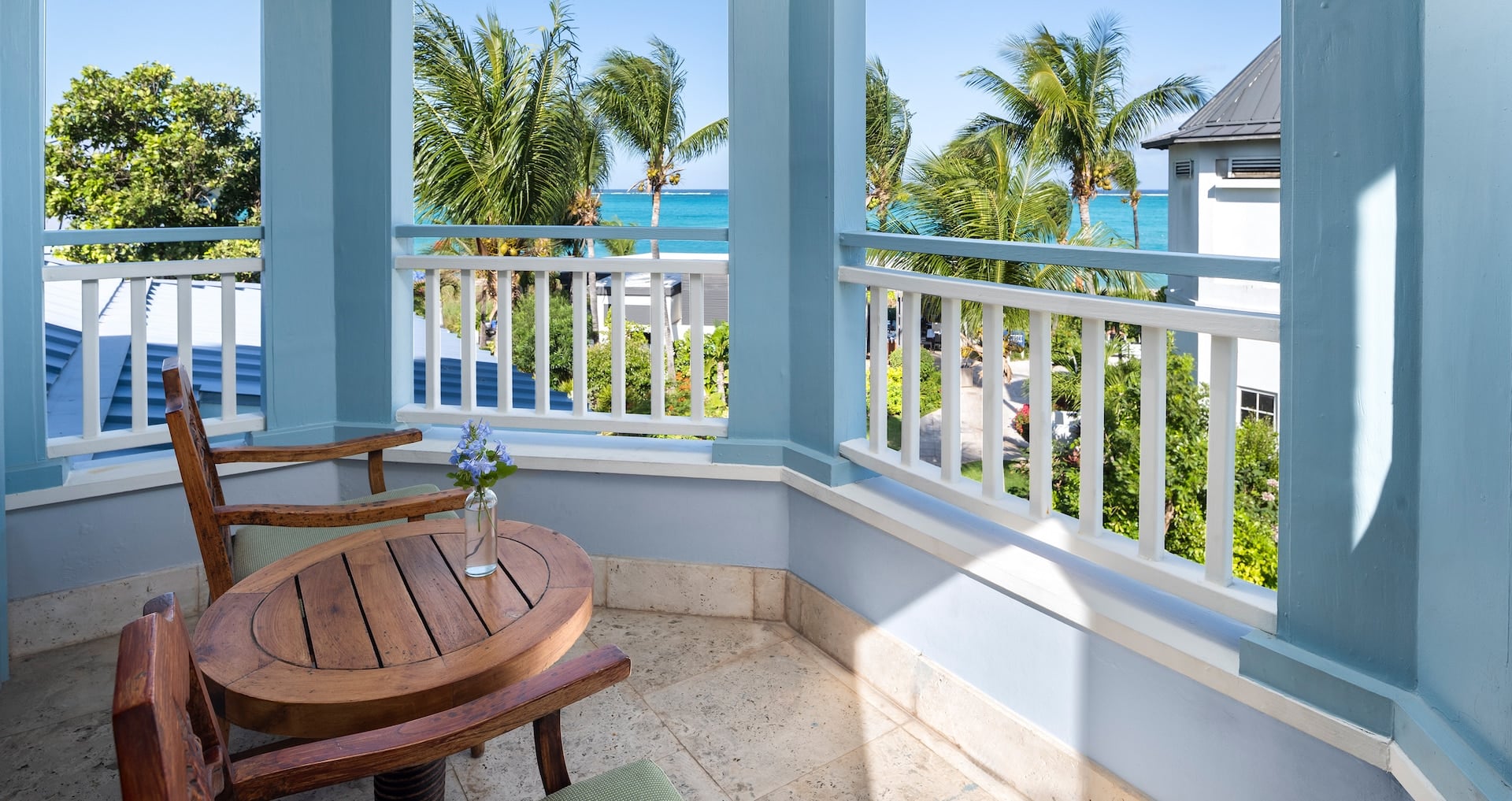 Private terrace view of the beach from the Key West Oceanview Three Bedroom Butler Villa
