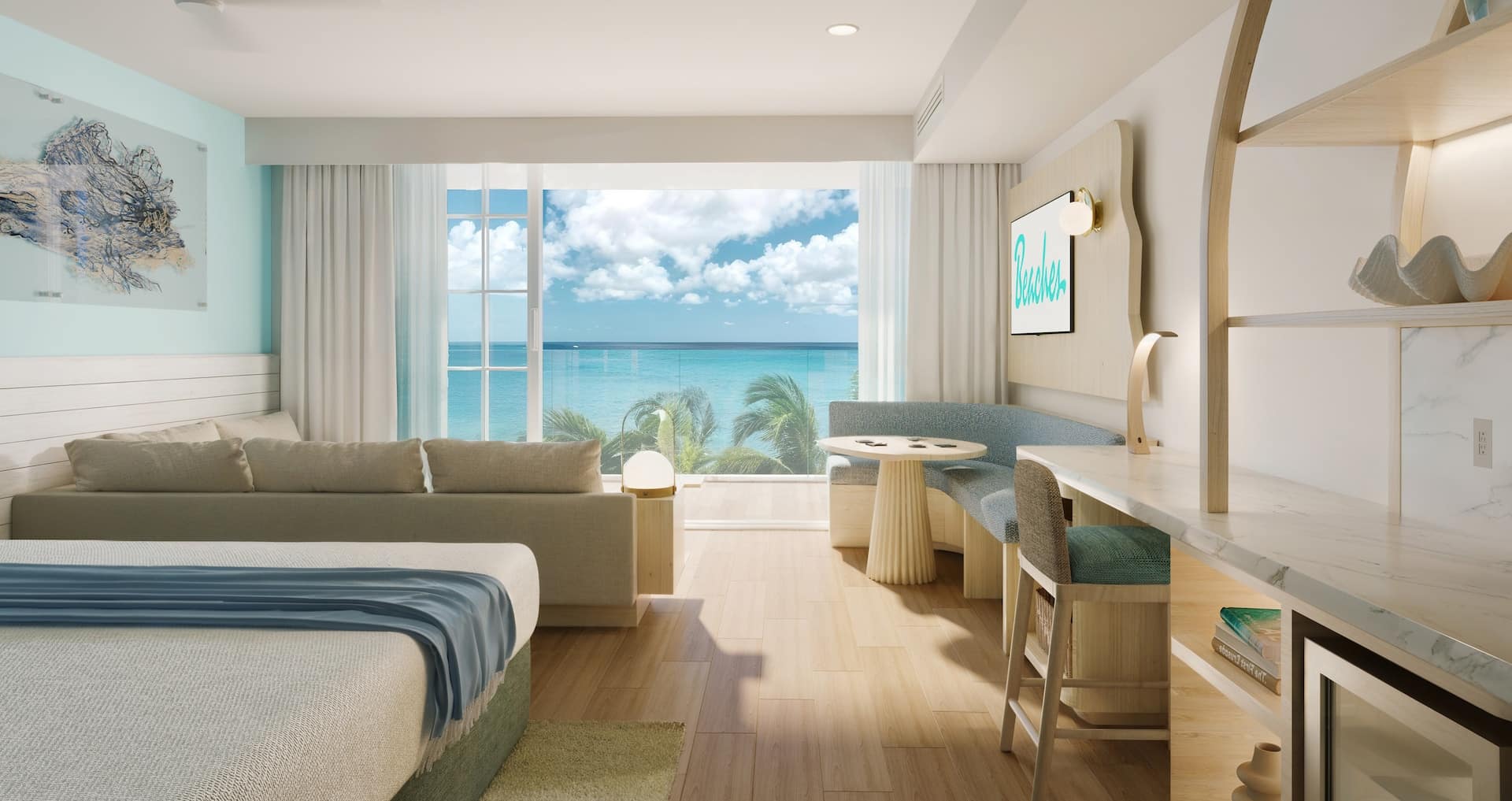 view of the master bedroom looking out onto Grace Bay from inside the Treasure Beach Oceanview Concierge Suite