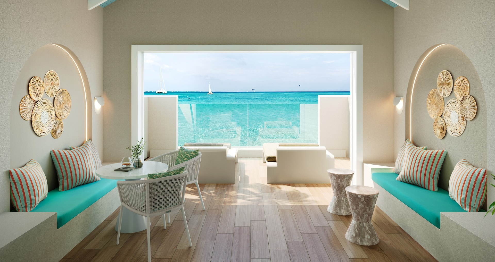 view of the private balcony overlooking Grace Bay beach from inside the Treasure Beach Oceanview Two-Story 2-Bedroom Butler Suite
